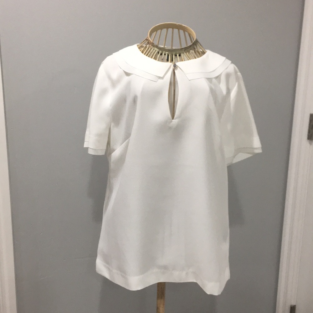 Cream short sleeved blouse